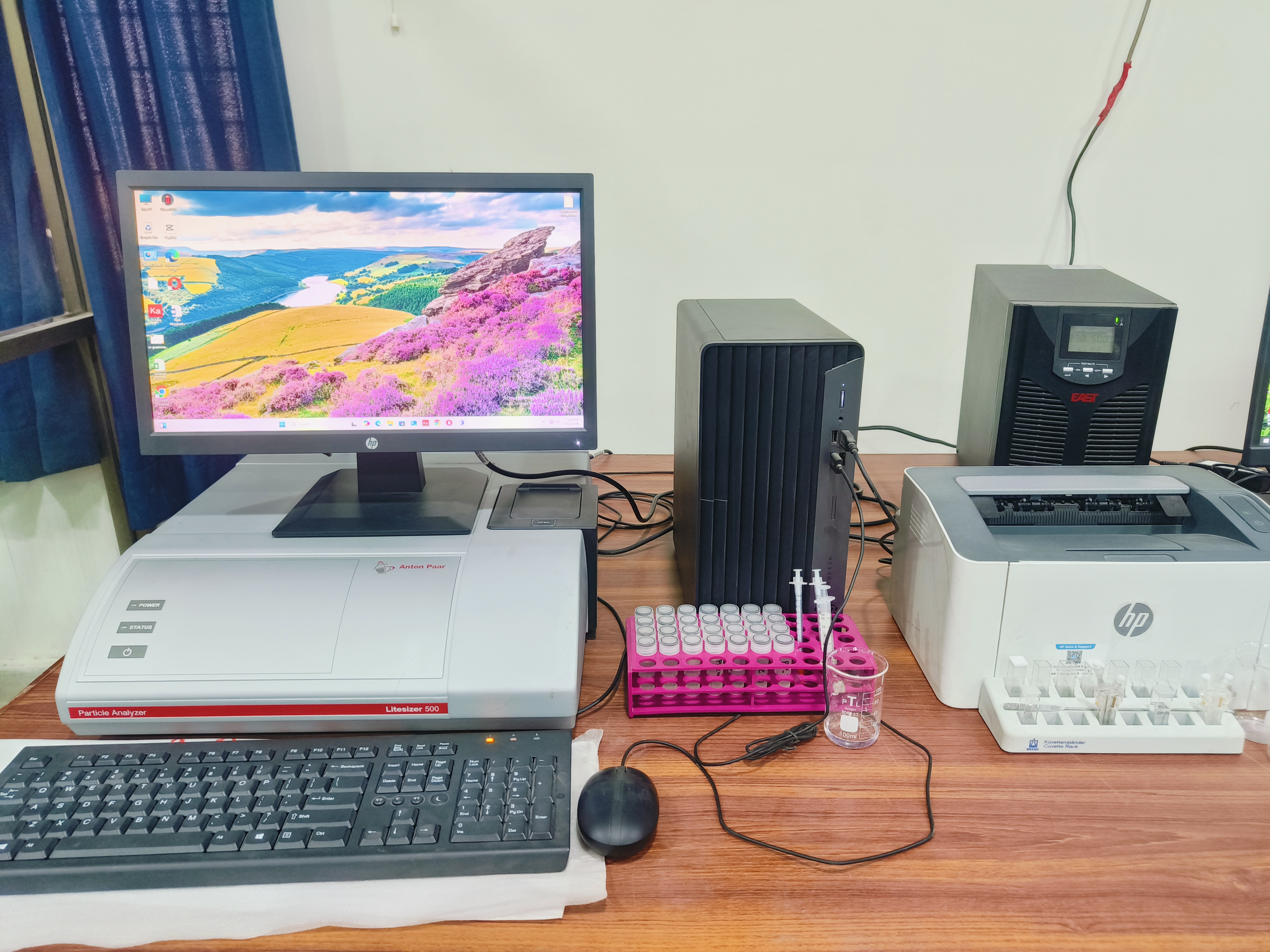 Virtual reality headset and controllers set up on a lab desk